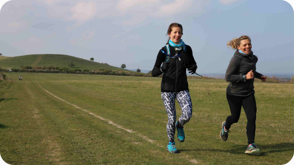 Female trail runners in Ashridge in the Chiltern Hills.