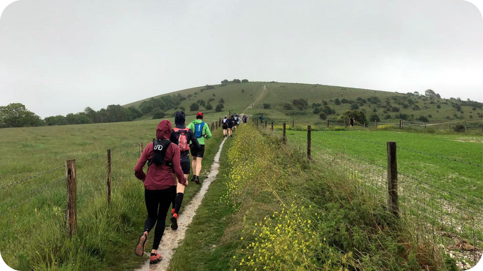 Trail runners on the South Downs, Sussex.